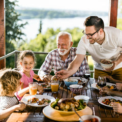 Family gathering enjoying the Ultimate Meat Medley Jumbo Survival Food Kit.